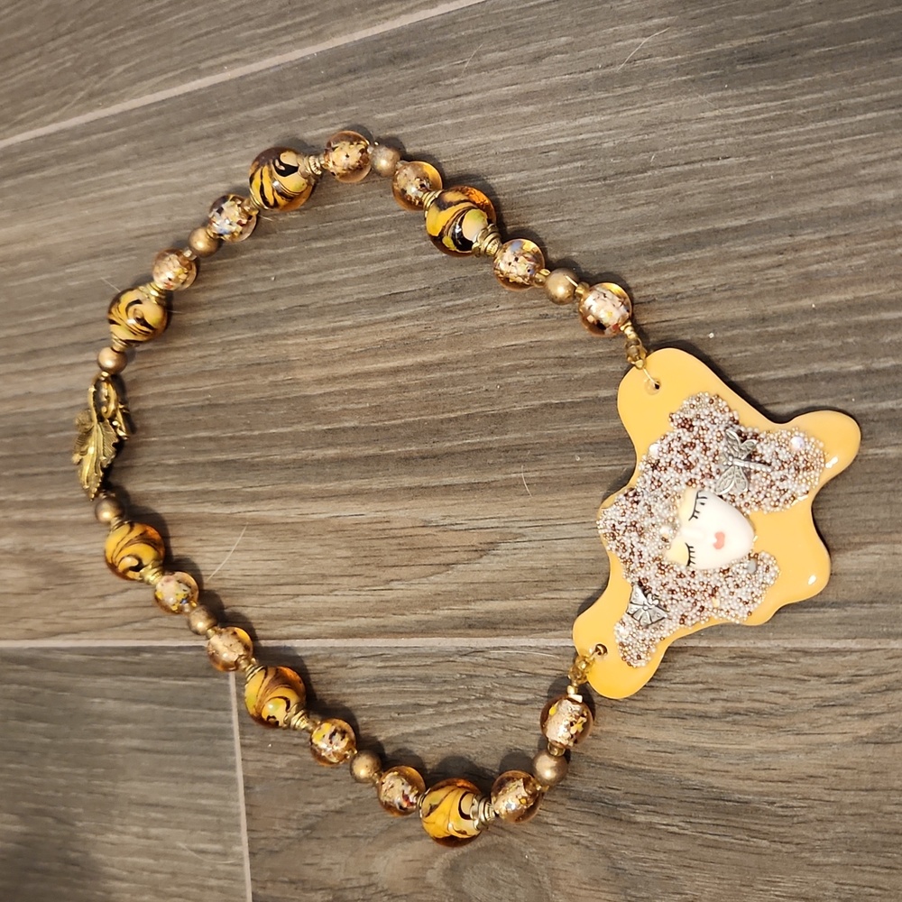 Yellow and Gold beaded necklace by Mary Lou Bartlett